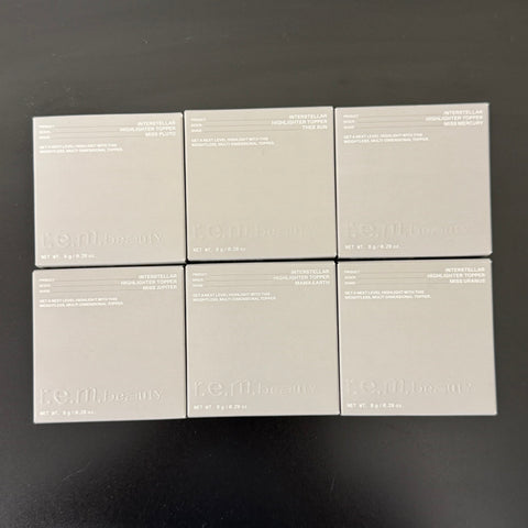 WHOLESALE R.E.M. BEAUTY INTERSTELLAR HIGHLIGHTER TOPPER 0.28 OZ - ASSORTED COLORS - 50 PIECE LOT